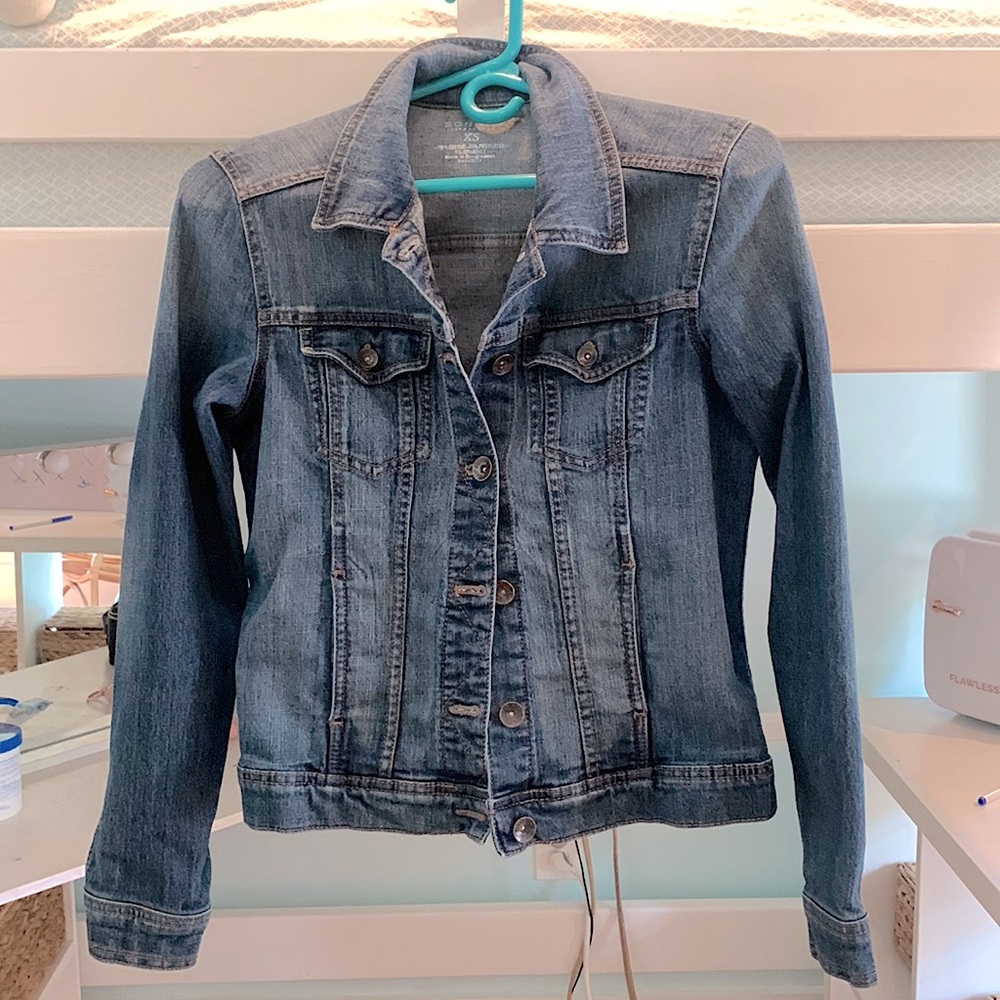Button down Denim Jean Jacket. Perfect for all seasons as a light cover up!